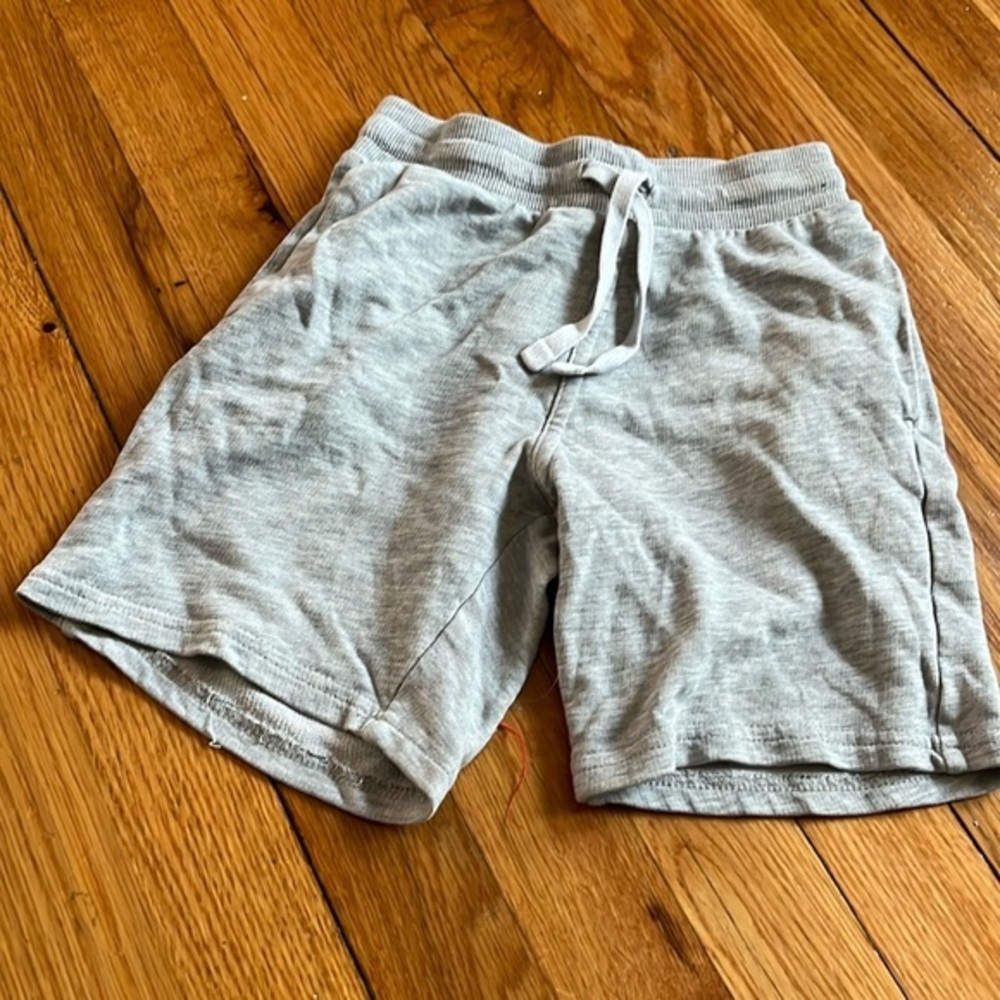 Gently used H&M 6/7 grey sweat shorts.